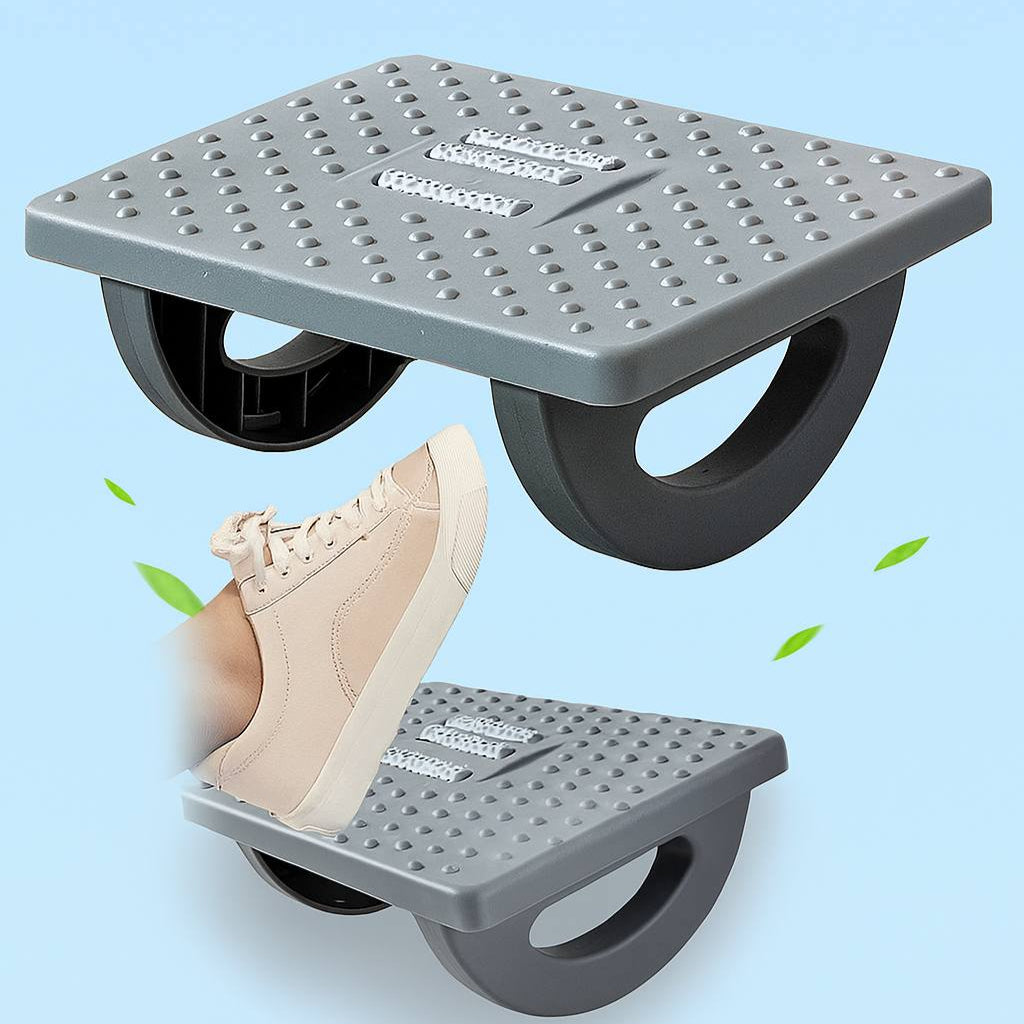 Gray foot exercise device with a shoe on a light blue background